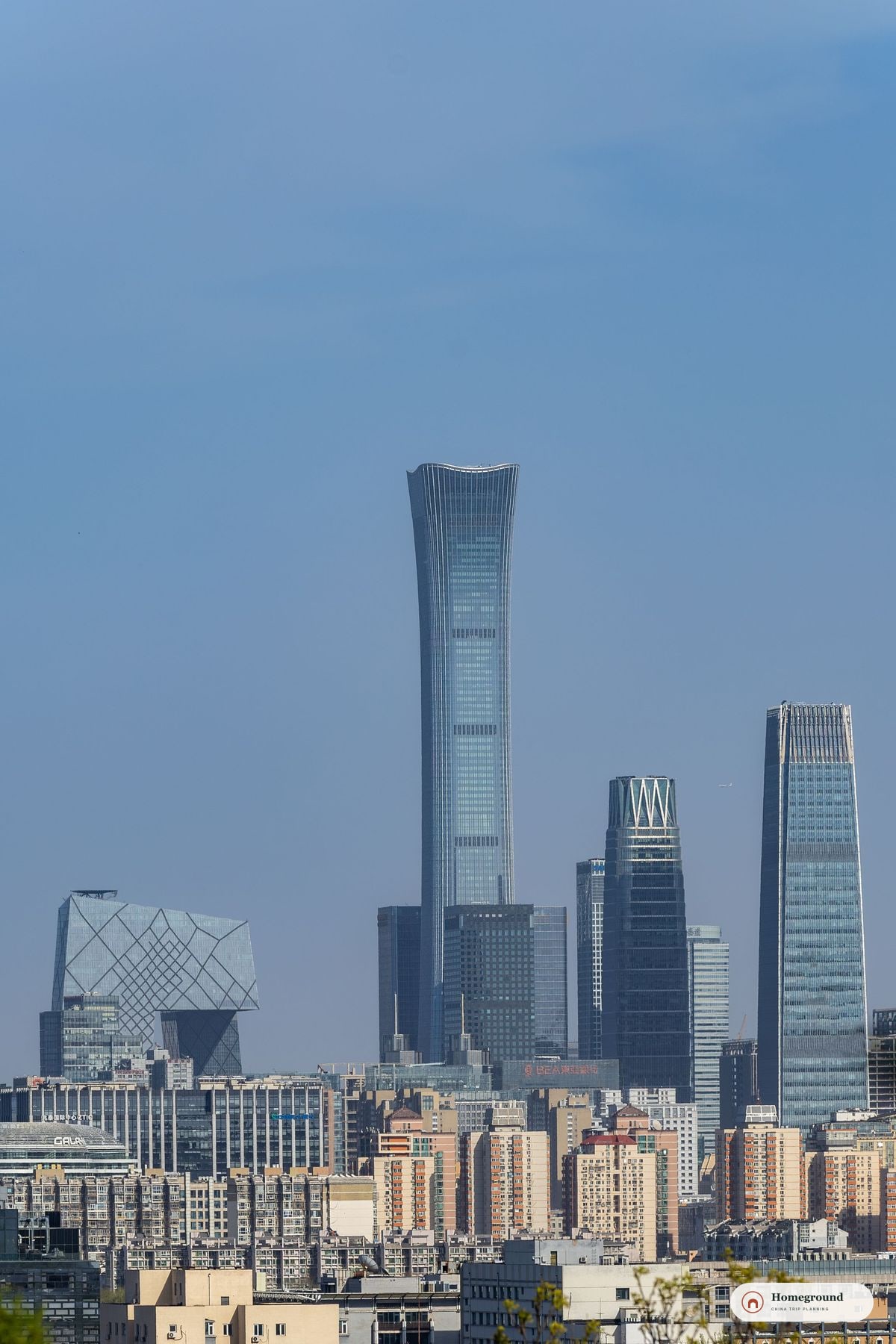 Beijing’s contemporary skyline, including the China Zun tower, seen in clear daylight.