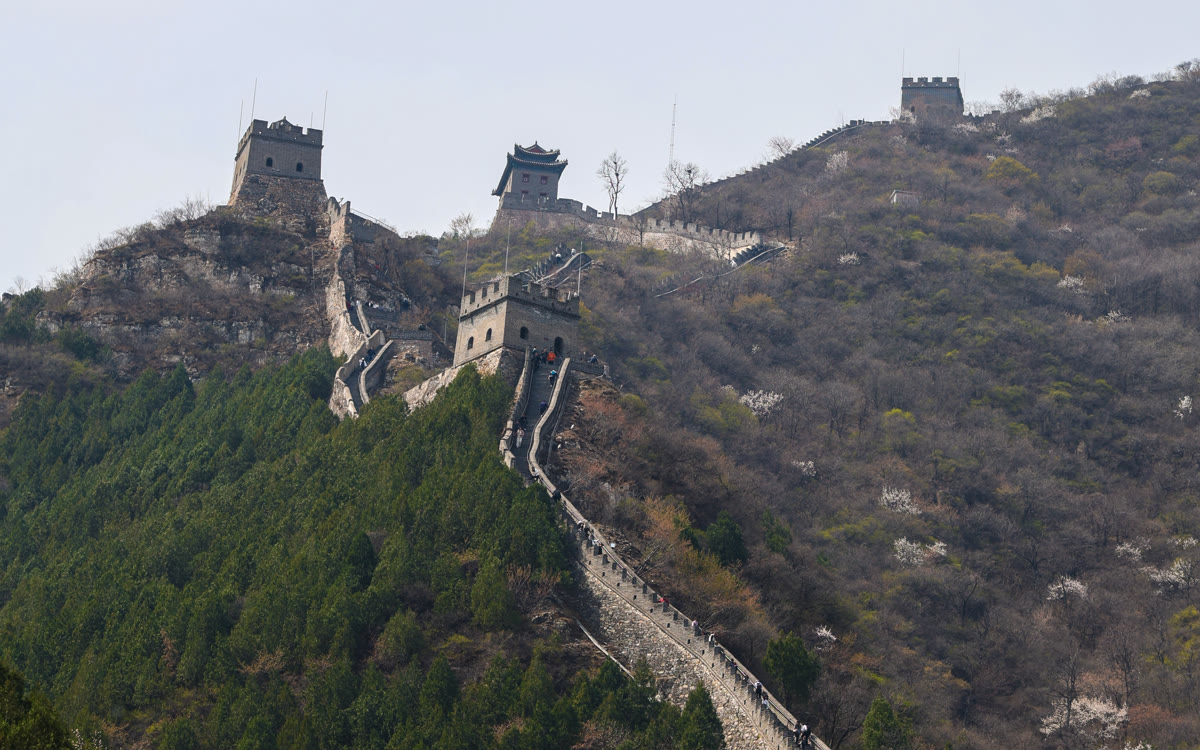 The Great Wall crossing a mountain ridge near Beijing in spring.