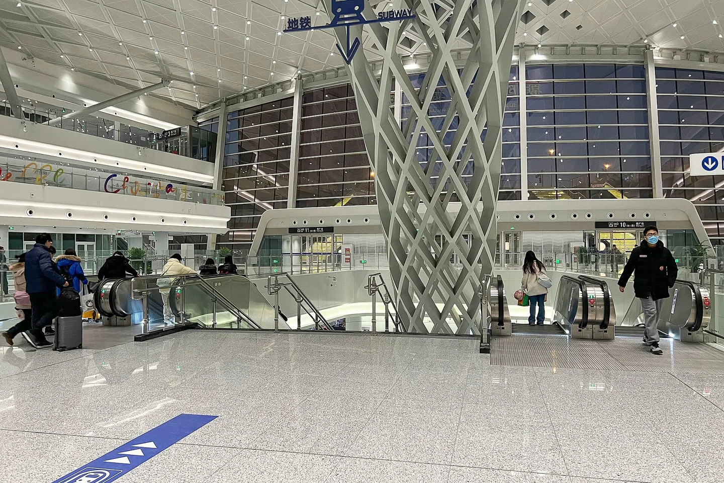 Subway entrance inside the integrated transport hub at Beijing Chaoyang Railway Station.