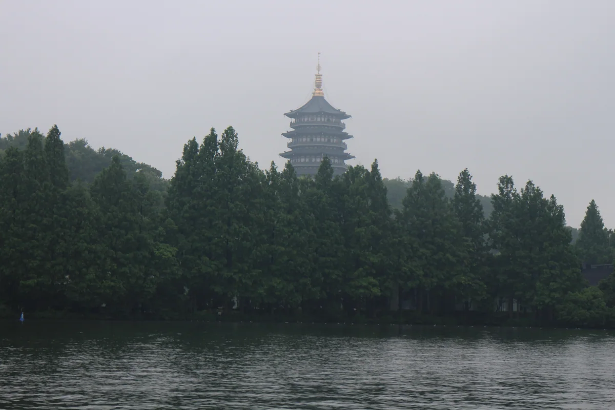 The present Leifeng Pagoda rises above trees on the south side of West Lake.