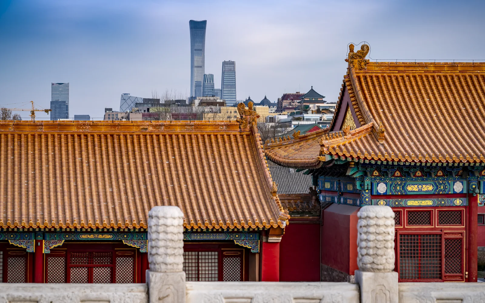 Beijing's historic roofs with the modern CBD in the distance