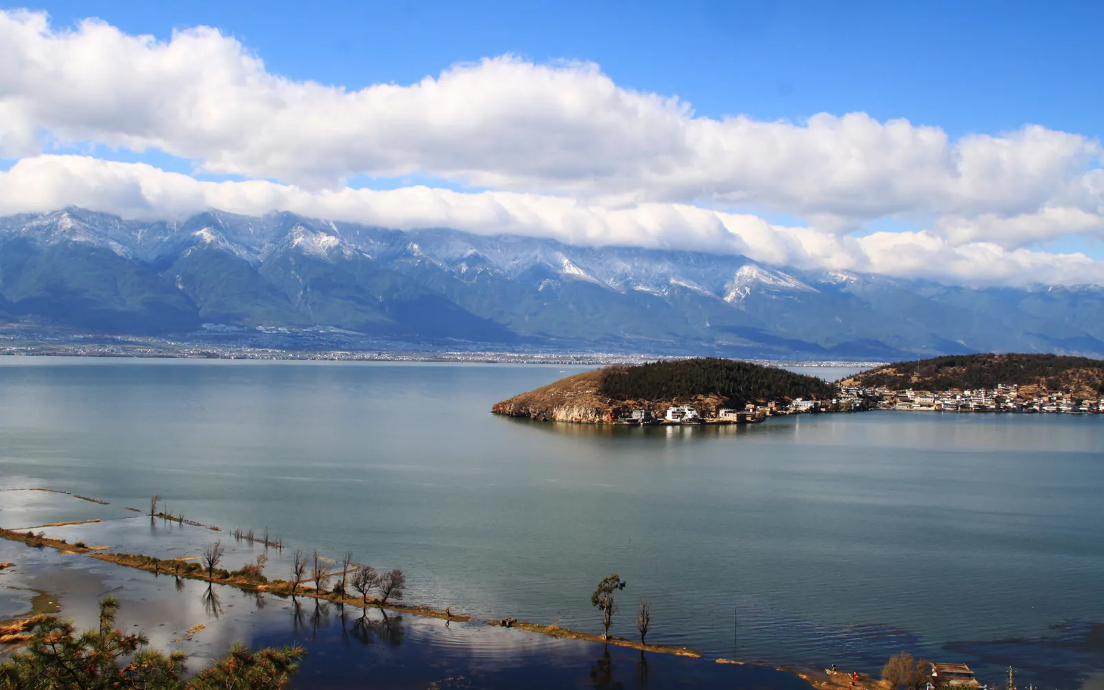 Erhai Lake below the snow-capped Cang Mountains in Dali