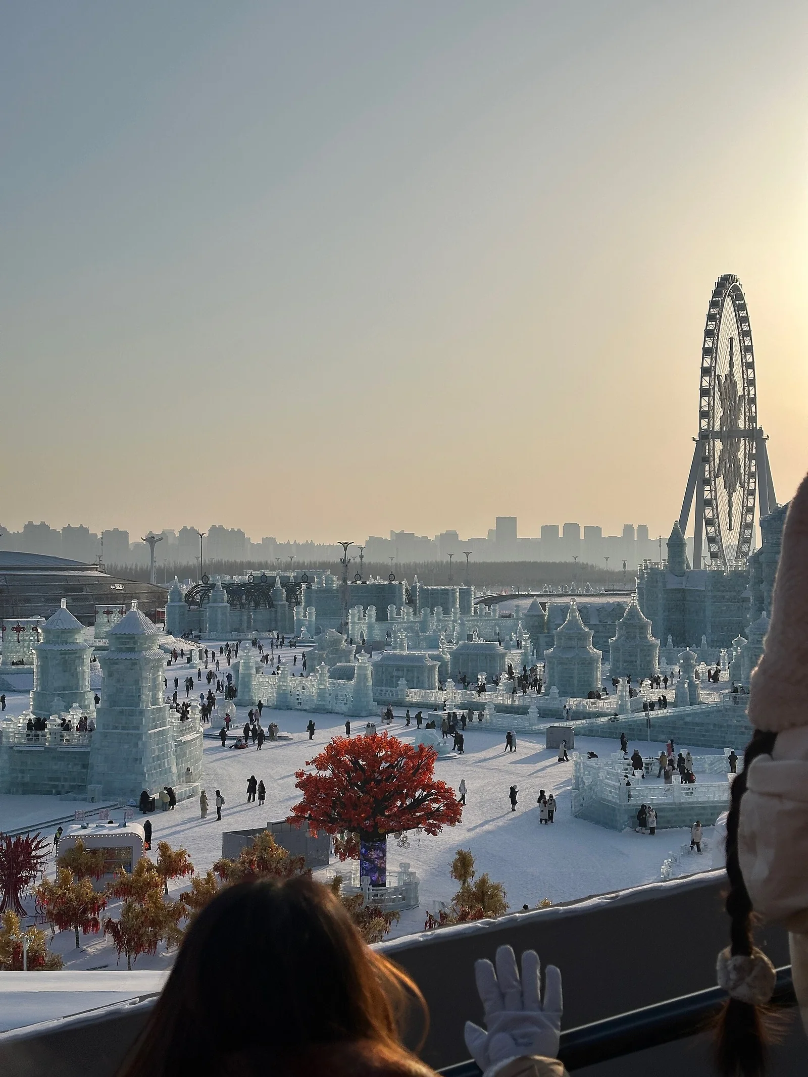 Ice buildings and a Ferris wheel at Harbin Ice and Snow World