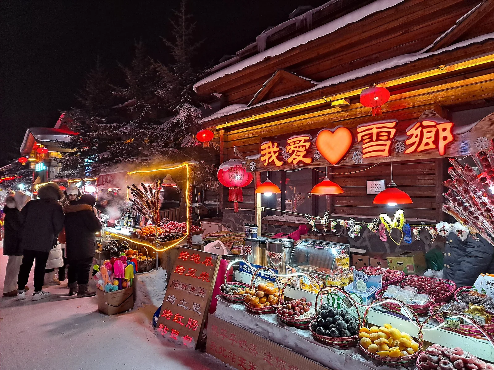 Evening food stall and snow-covered street in China Snow Town