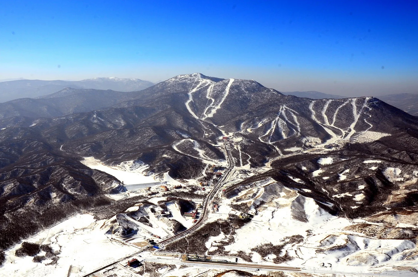 Snow-covered ski runs across Yabuli's mountain slopes