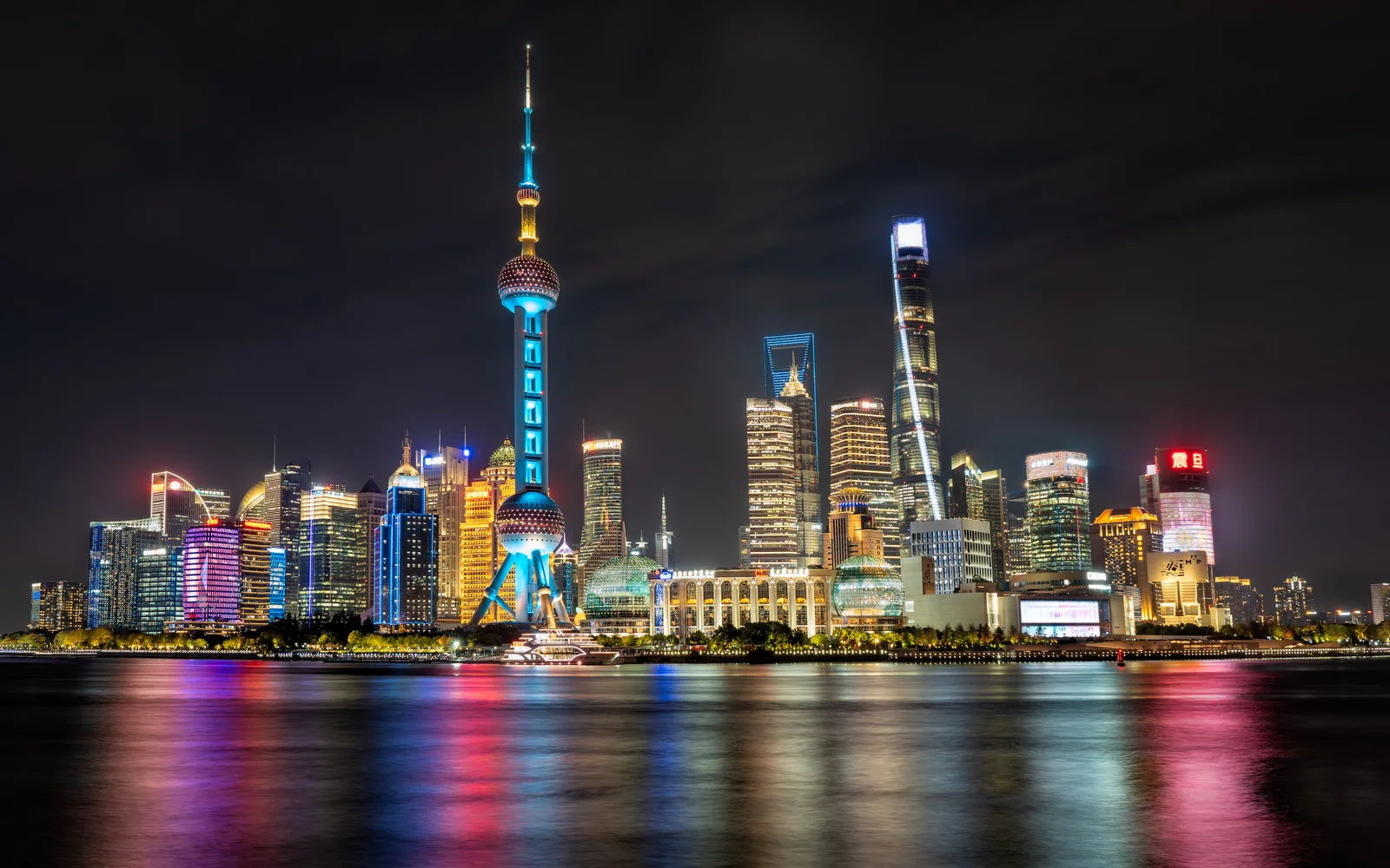 Shanghai's illuminated skyline across the Huangpu River