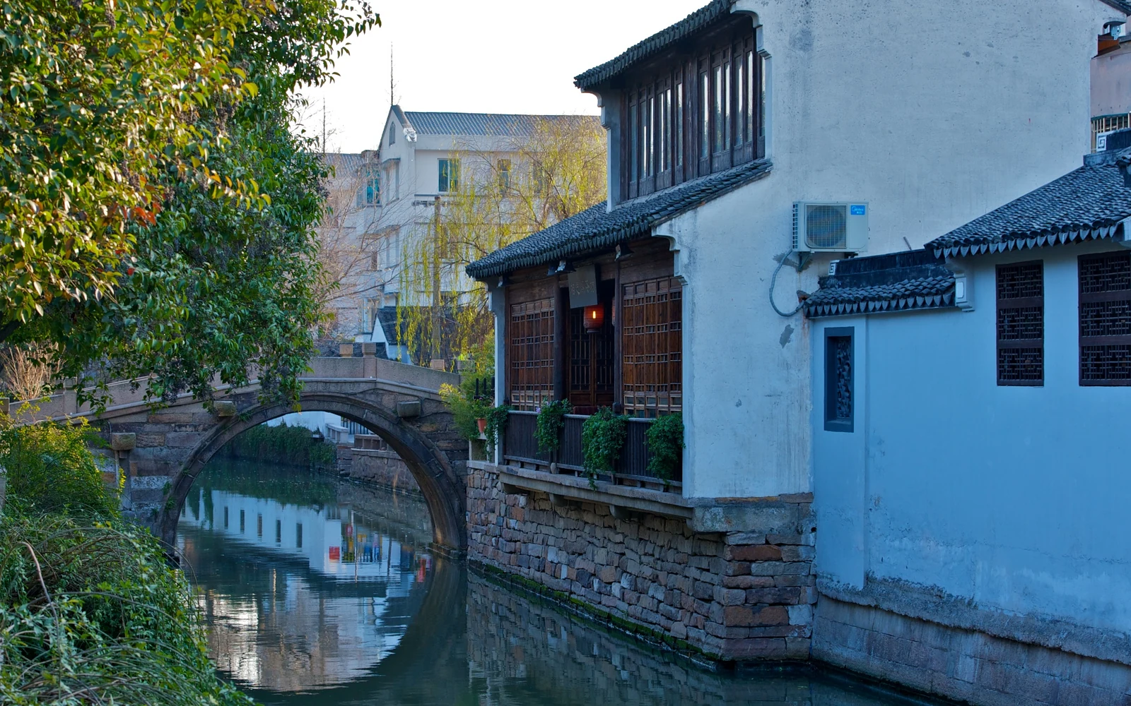 Stone bridge and canal along Pingjiang Road in Suzhou, photographed in 2012.