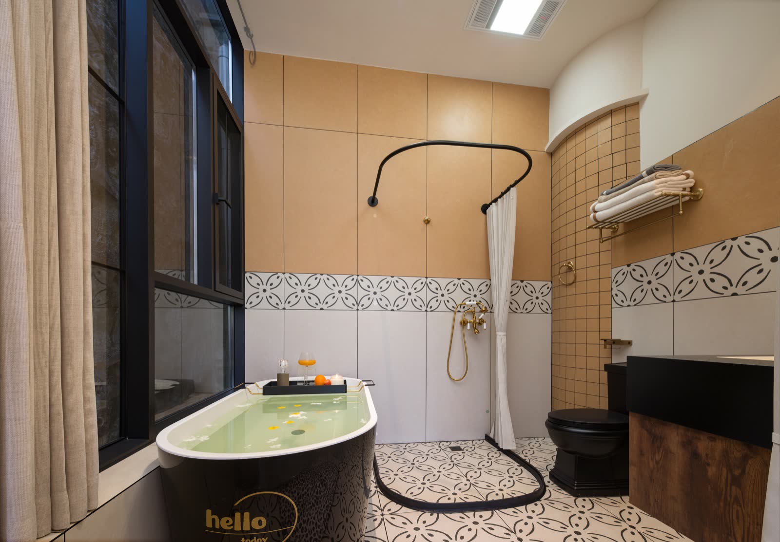Bathroom with a freestanding bathtub, shower and toilet